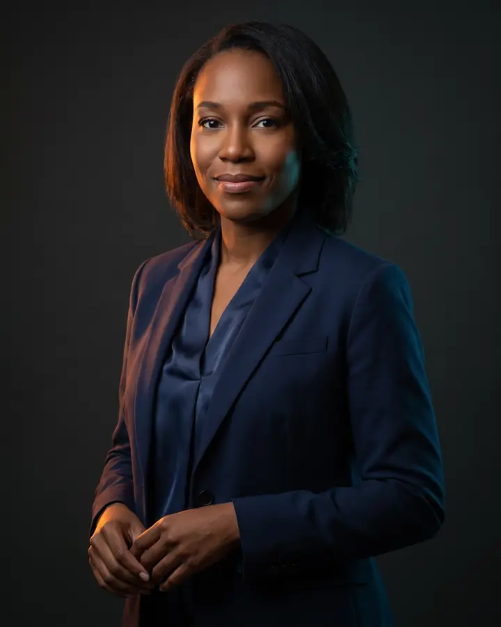 Danielle Okonkwo, partner for catastrophic injury, photographed against a charcoal backdrop